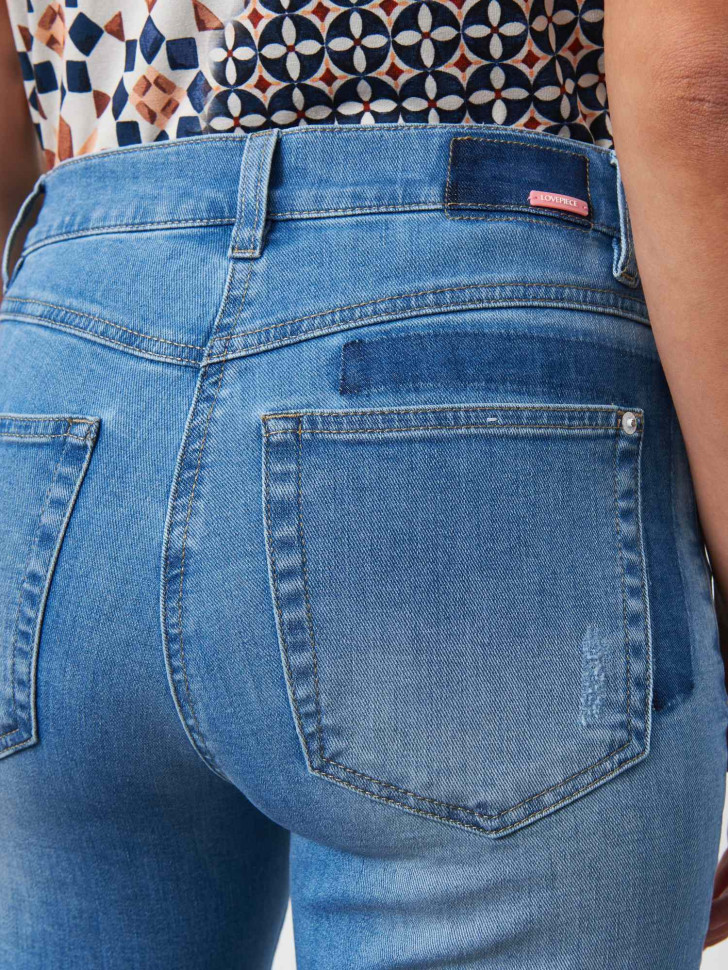 Джинсы с потертостями