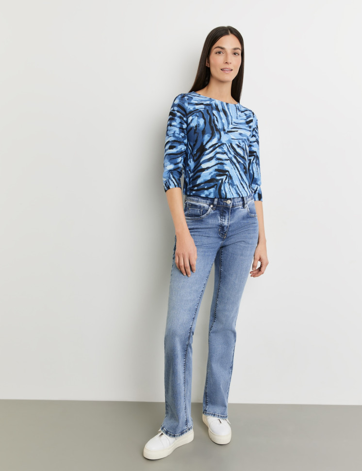 Джинсы клеш