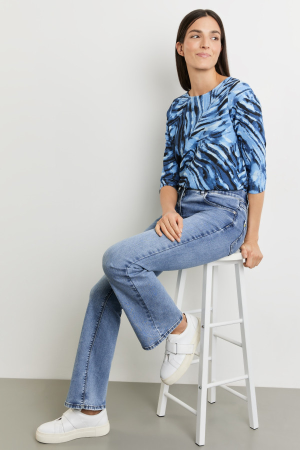 Джинсы клеш