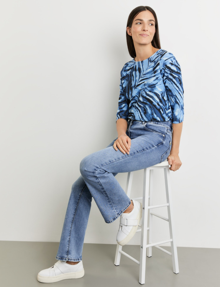 Джинсы клеш