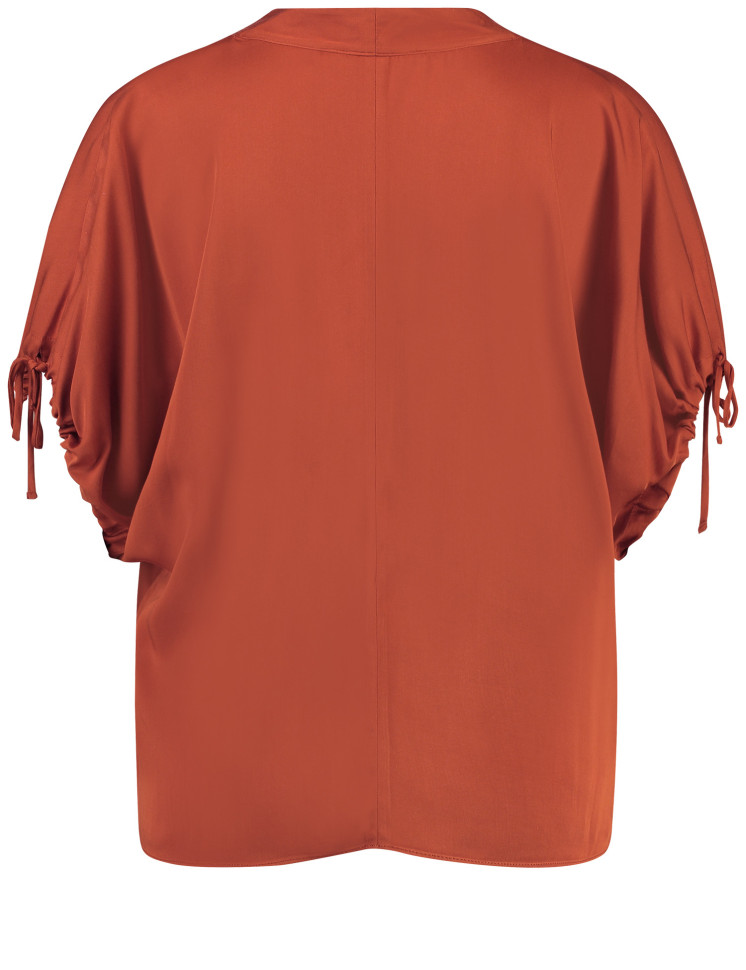 Блузка свободного кроя