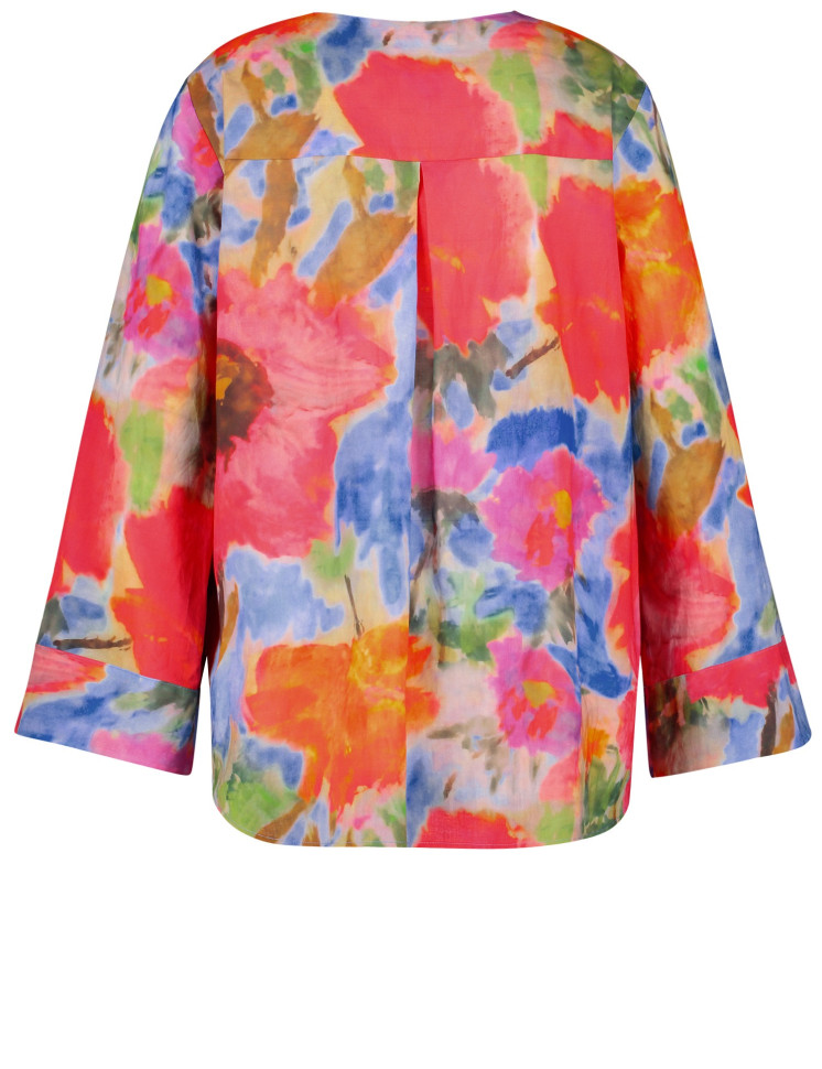 Блузка с широкими рукавами