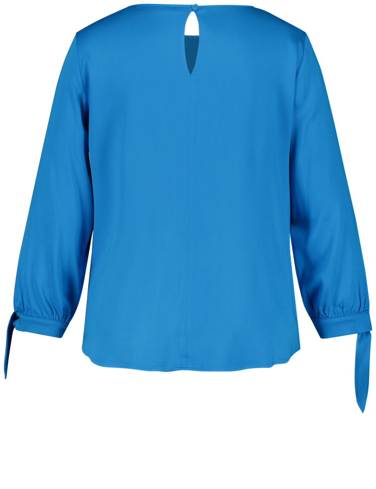 Блузка с завязками