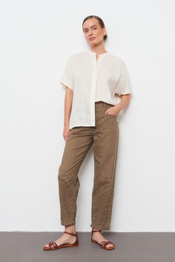 Джинсы с перфорацией