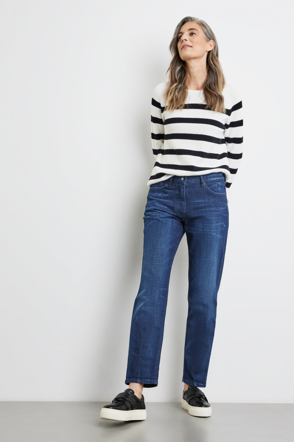 Джинсы с потертостями