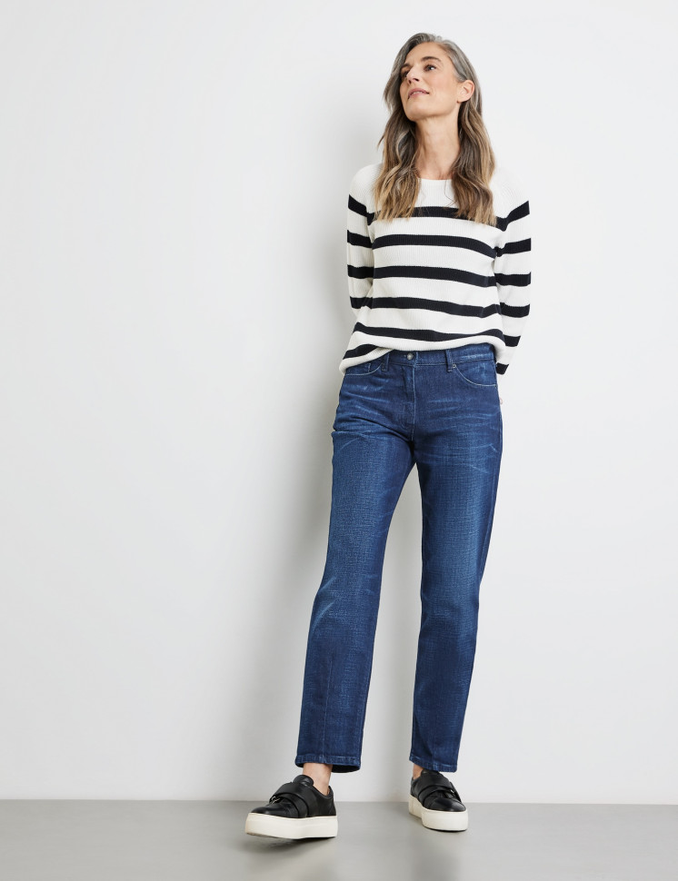 Джинсы с потертостями