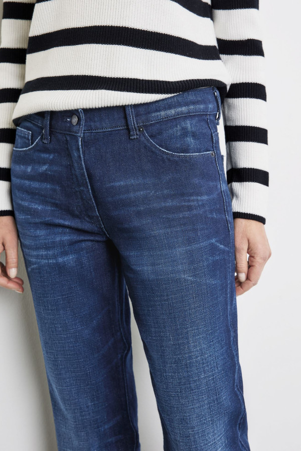 Джинсы с потертостями